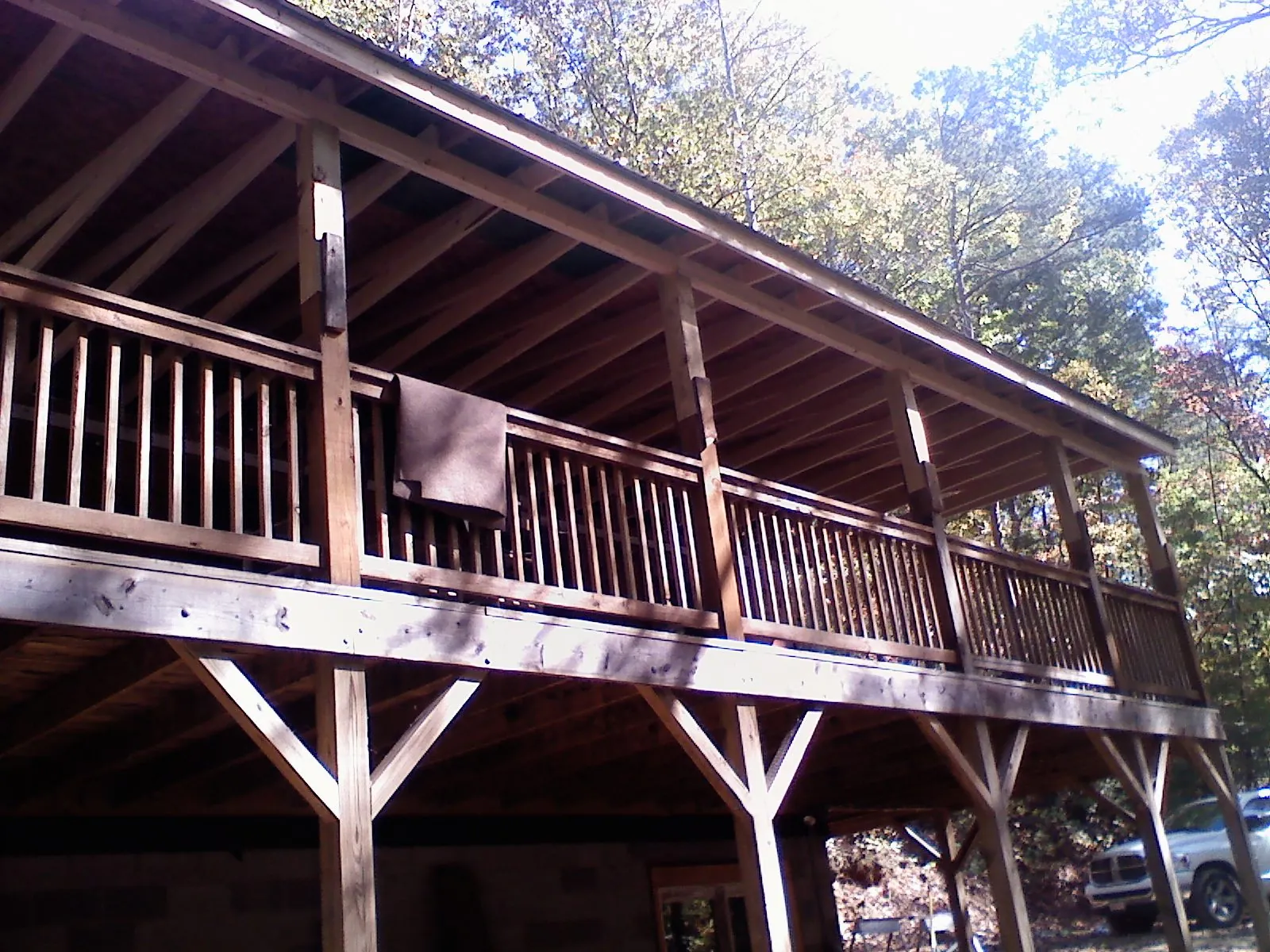Timber framing under a new elevated porch and deck — Roof Leak Repair in Grand Bay by Roofing Brothers